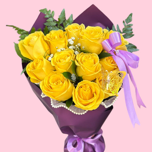 Dozen Yellow Roses – Hand Wrapped with Butterfly Accent - Magic World Flowers